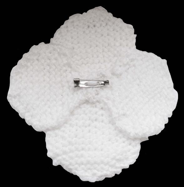 Hand knitted brooch in white